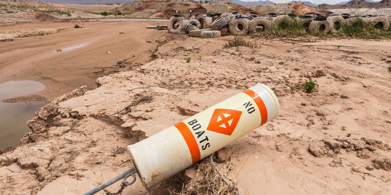 Warning Buoy Lies on the Dirt in Lake Mead