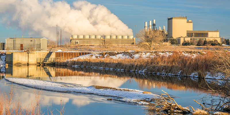 Steam Pours From Gas-Powered Electrical Plant Cooling Towers