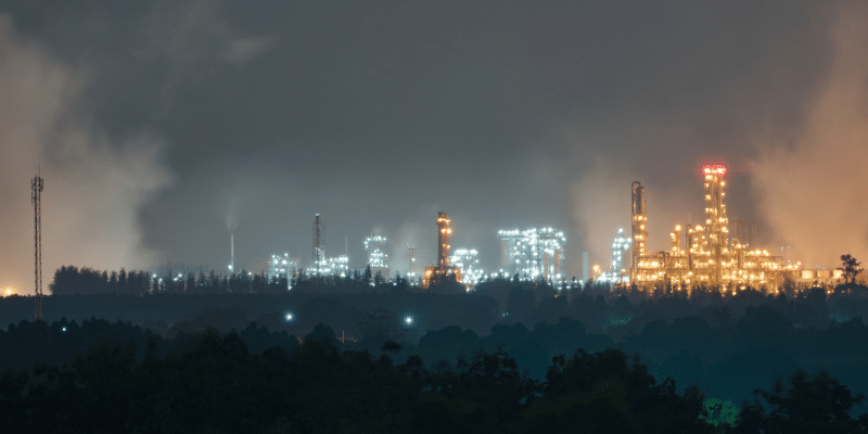 Lights of Industrial Park Shine on Horizon at Night