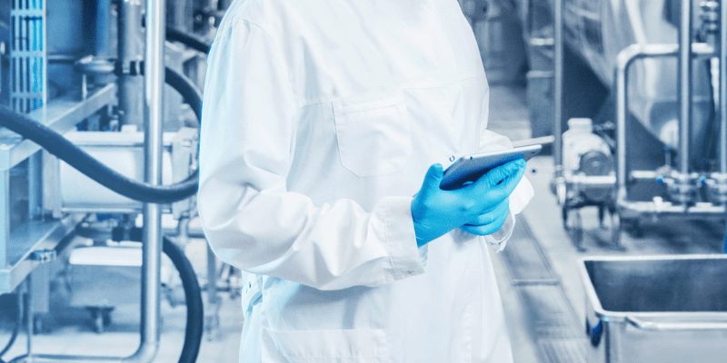 A Worker Inspects Production Line