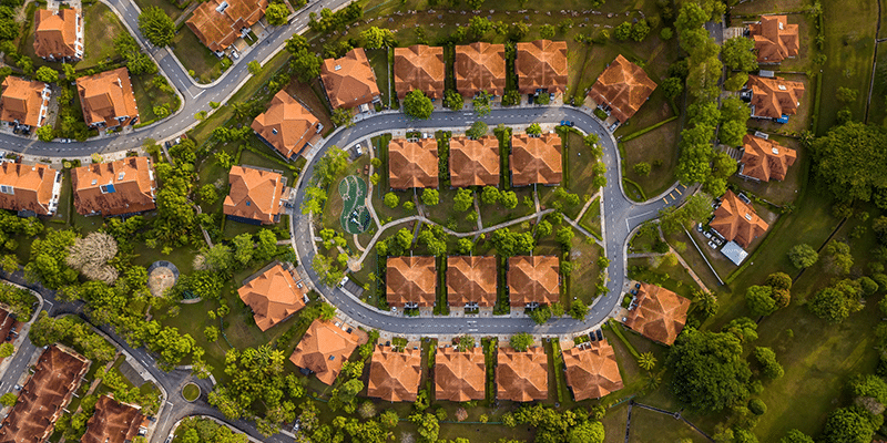 Aerial view of residential development supported by phased municipal infrastructure
